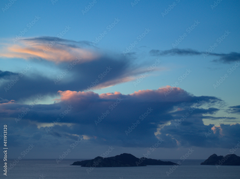 Clouds over the islands in the middle of the sea.