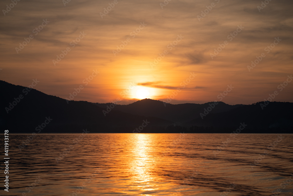 Beautiful Sunset with nice sky with island on the background