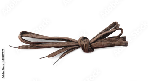 Dark brown shoe laces tied in knot isolated on white, top view