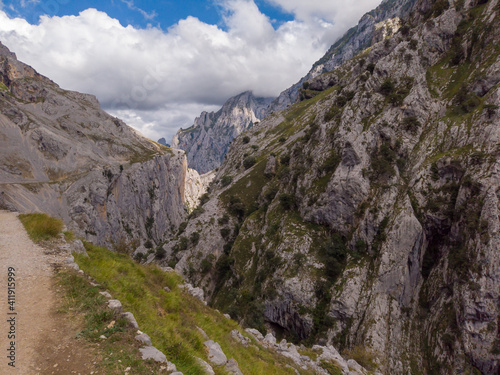 The Cares Route in the heart of Picos de Europa National Park, Cain-Poncebos, Asturias, Spain. Narrow and impressive canyon between cliffs, bridges, caves, footpaths and rocky mountains. © An Instant of Time