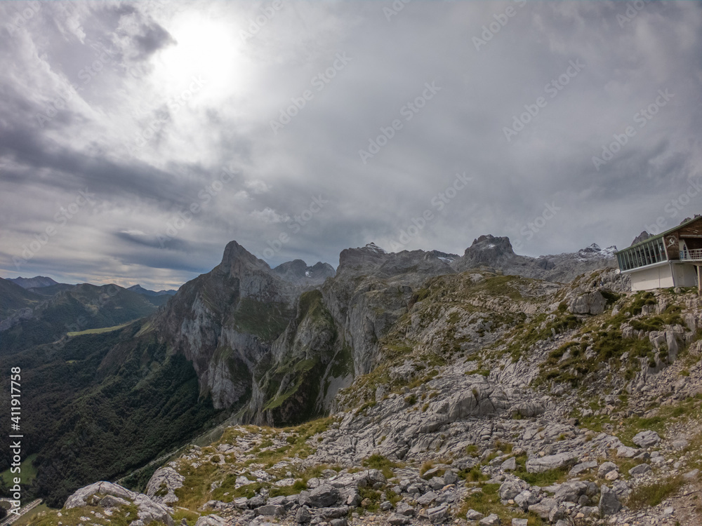 The Majestic mountains of the Eastern Massif of the Picos de Europa. Eagle flying over Pena Remona. The Eastern Massif, or Andará, between the Duje and Hermida gorges.