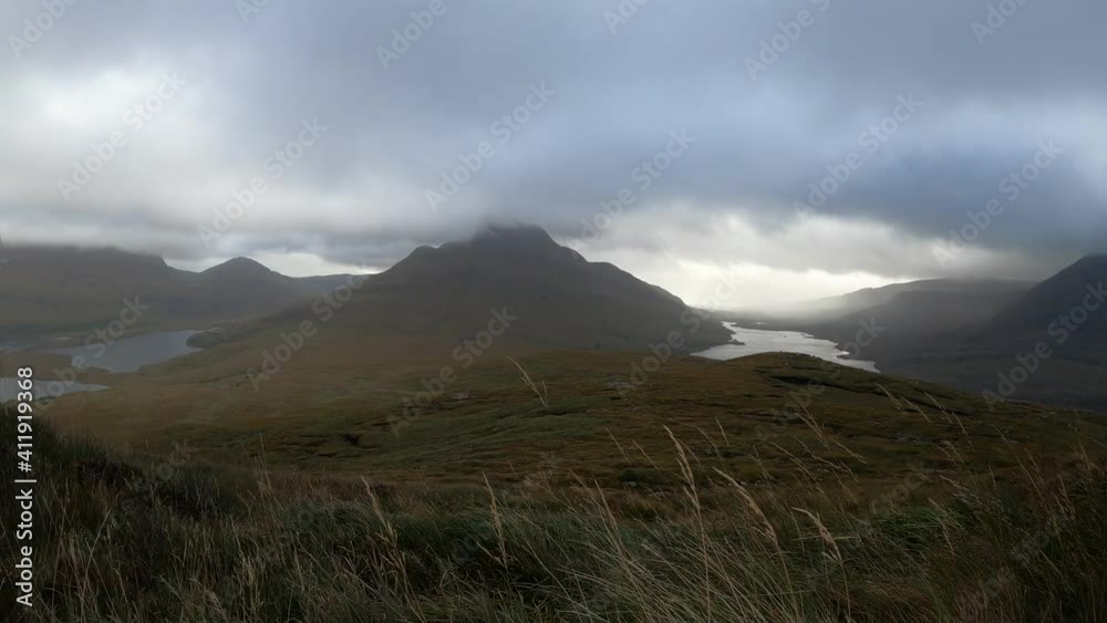 Time lapse video of Stac Pollaidh in Scotland - The clouds race over the mountain - 4K Video Time lapse video of Stac Pollaidh in Scotland - The clouds race over the mountain - 4K Video