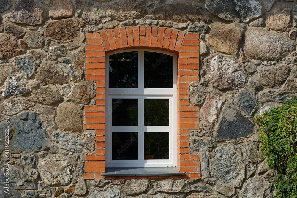 Window on a stone wall.