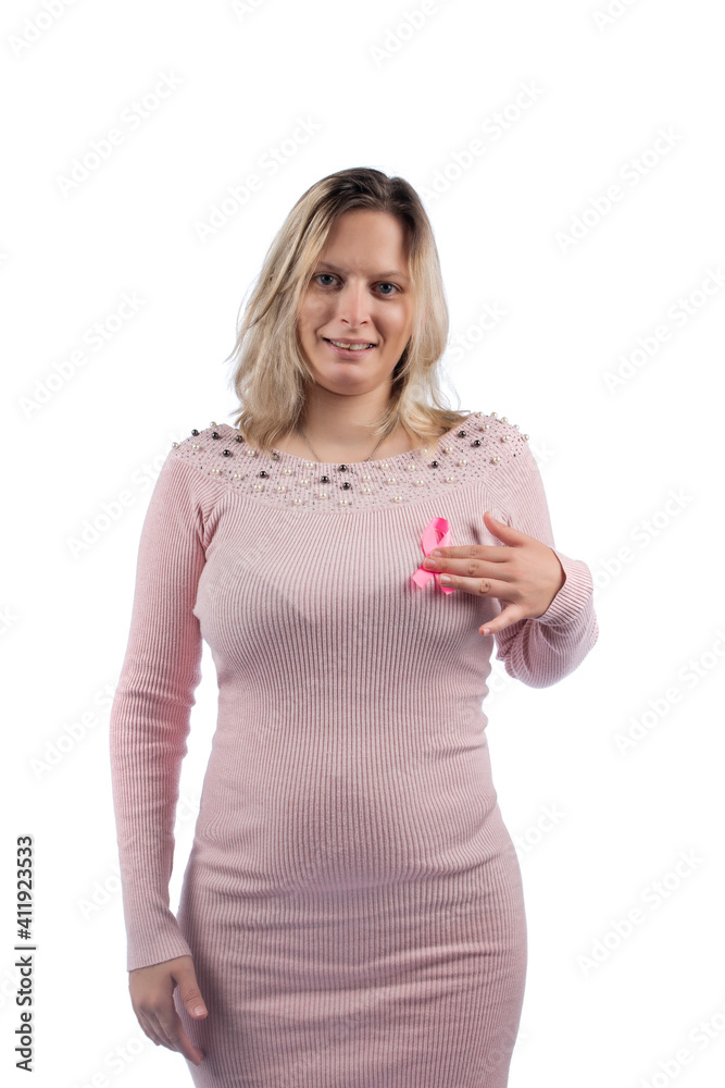 Caucasian girl holding breast cancer ribbon Caucasian girl holding breast cancer ribbon