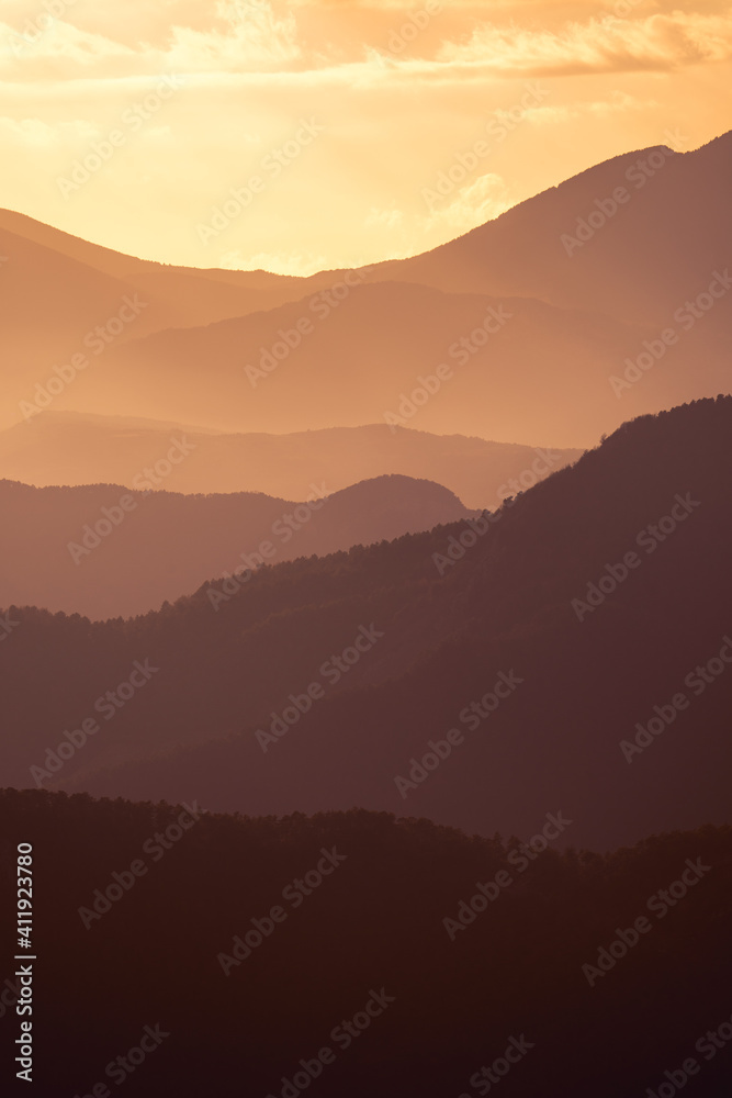 Landscape mountains in line warm orange with reflex and light
