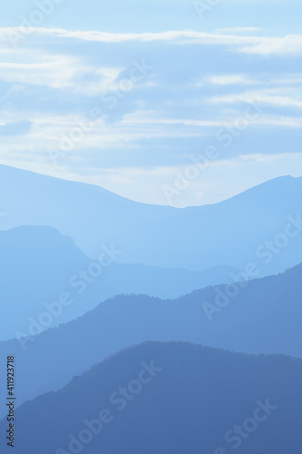 Landscape mountains in line blue sky with reflex and light and clouds