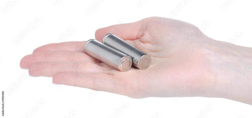Batteries AA power in hand on white background isolation Batteries AA power in hand on white background isolation