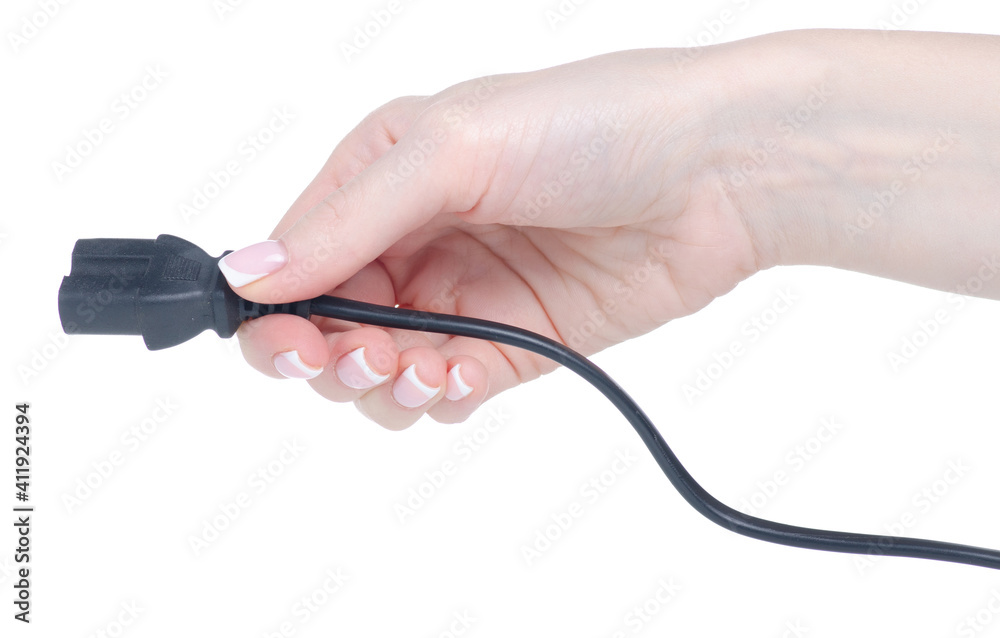 Plug in hand on white background isolation Plug in hand on white background isolation
