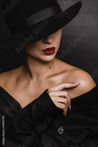 Female silhouette with red lipstick on the lips
