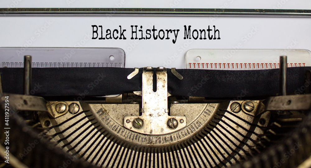 Black history month symbol. Text 'Black history month' typed on retro typewriter. Black history month concept. Beautiful background. Black history month symbol. Text 'Black history month' typed on retro typewriter. Black history month concept. Beautiful background.