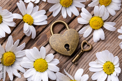 Golden padlock hearts with ...