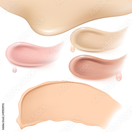 Smears of foundation for face.A smear of lipstick. Cosmetic smear of liquid. Isolated on white background.