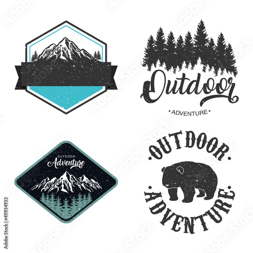 bundle of four outdoor adventure letterings emblems with bear and mountains