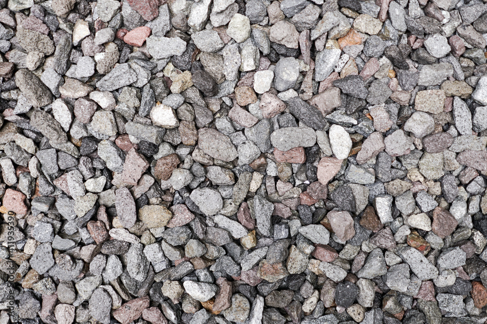 Stone pattern abstract ravel texture small stones, little rocks, pebbles in many shades of grey, white, brown, pink colour in close-up for granite texture background Stone pattern abstract ravel texture small stones, little rocks, pebbles in many shades of grey, white, brown, pink colour in close-up for granite texture background