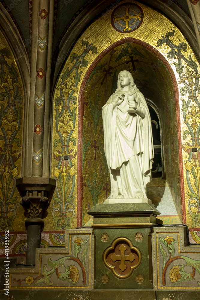 Lourdes, France, June 24, 2019: One of the statues in the Basilica of the Immaculate Conception in Lourdes,