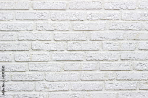 Modern abstract white brick wall textured background for text or design. Close up