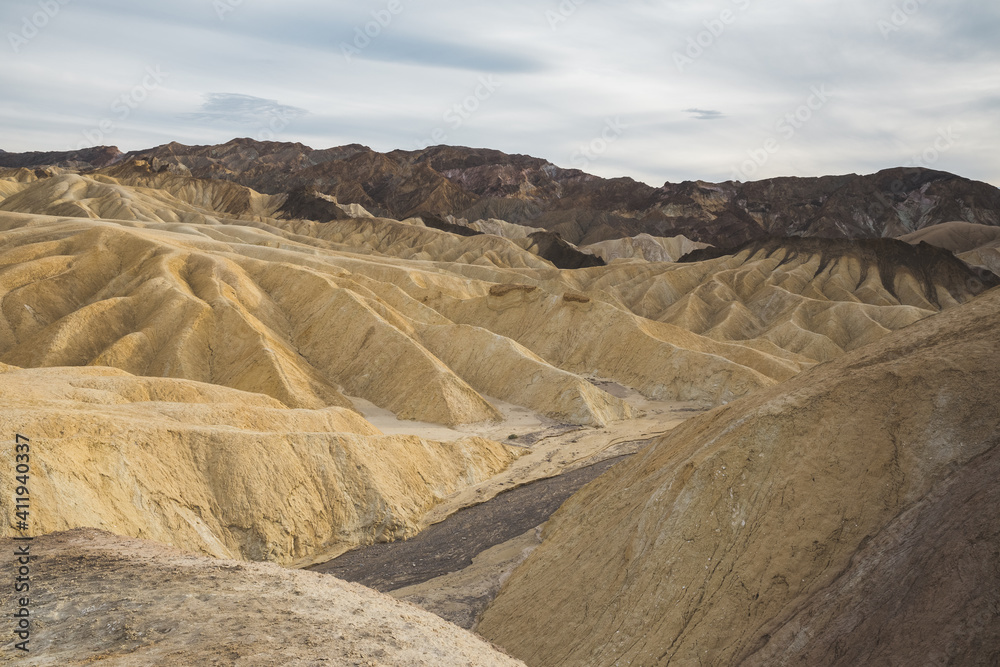 Naklejka premium Beautiful yellow hills and ridges of Zabriskie Point in Death Valley, California