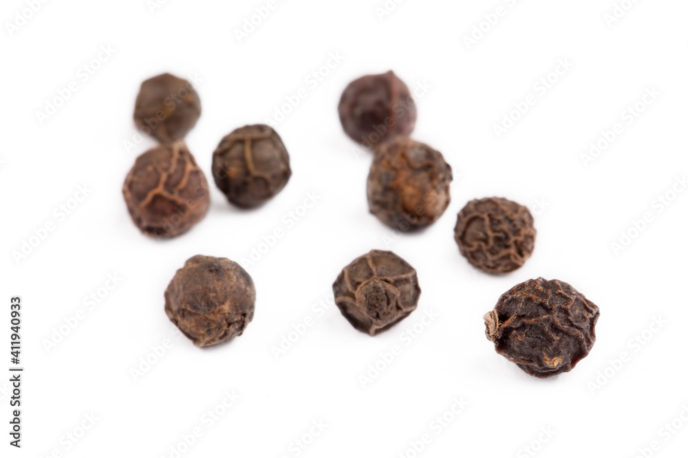 Grain black pepper on a white background Grain black pepper on a white background