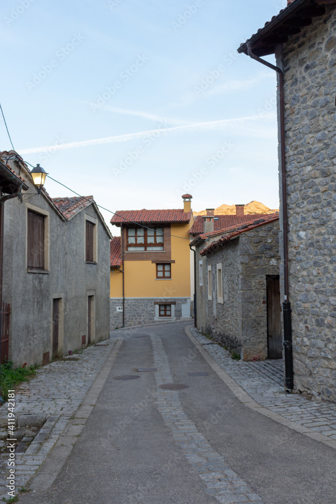 Sotres, Spain - September 3, 2020: Views of the streets and houses in Sotres village in the Europa Peaks (Picos de Europa National Park), Cantabrian Mountains, northern Spain.
