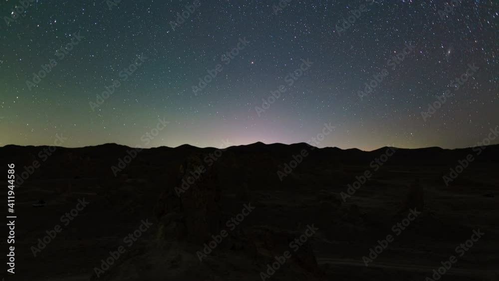 Time lapse of stars over tufa towers in Trona Pinnacles in California Time lapse of stars over tufa towers in Trona Pinnacles in California