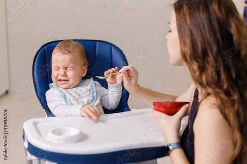 Принти на полотні Naughty caucasian infant kid is fussy and refuses to eat