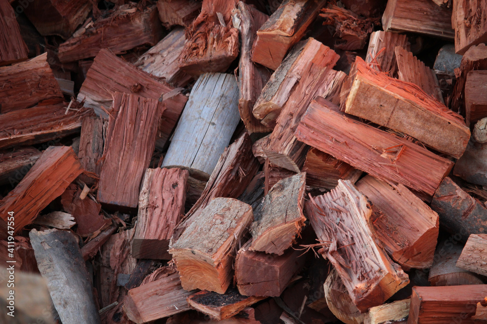 Eucalyptus firewood logs in a firewood stack Eucalyptus firewood logs in a firewood stack