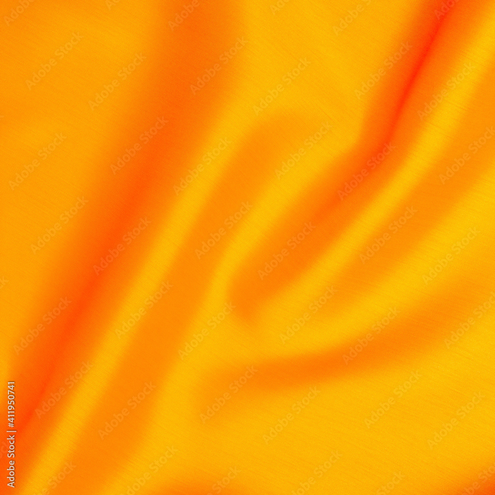 Smooth fabric texture with folds and wawes. Close up silk background Smooth fabric texture with folds and wawes. Close up silk background