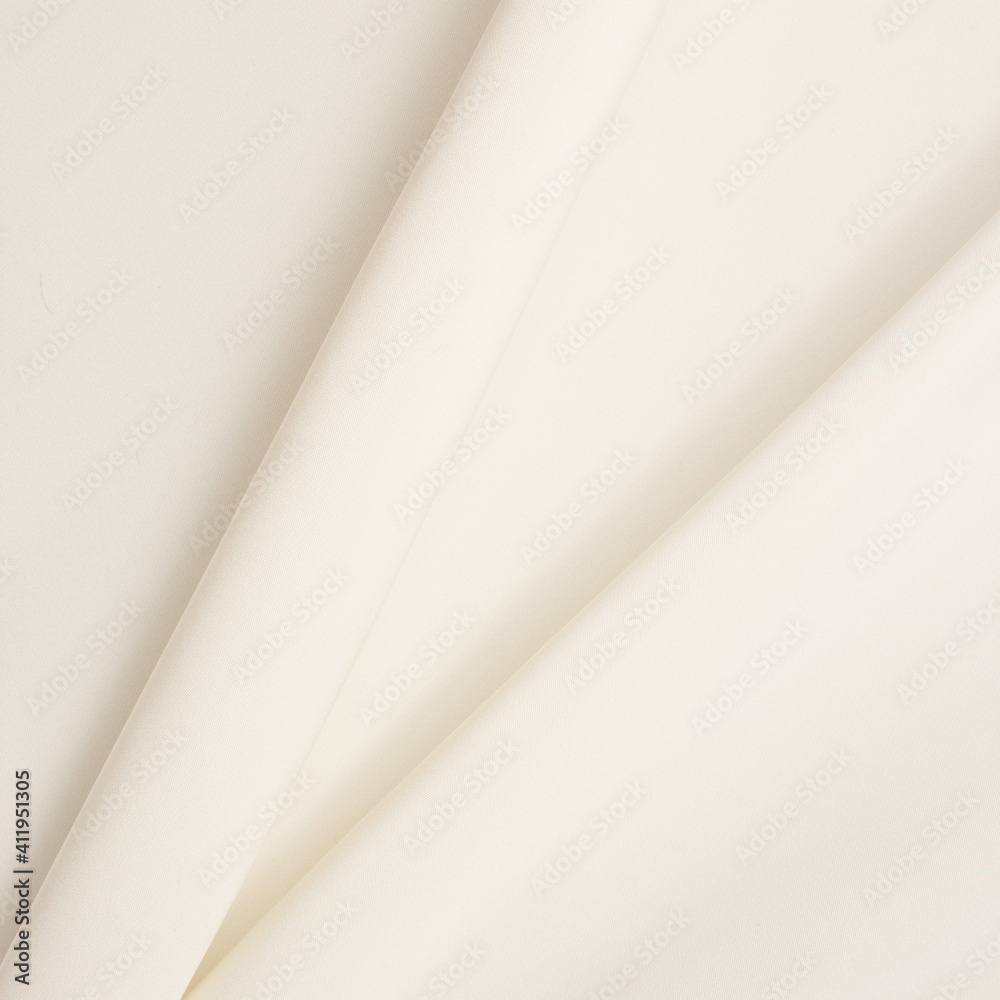 Smooth fabric texture with folds and wawes. Close up silk background Smooth fabric texture with folds and wawes. Close up silk background