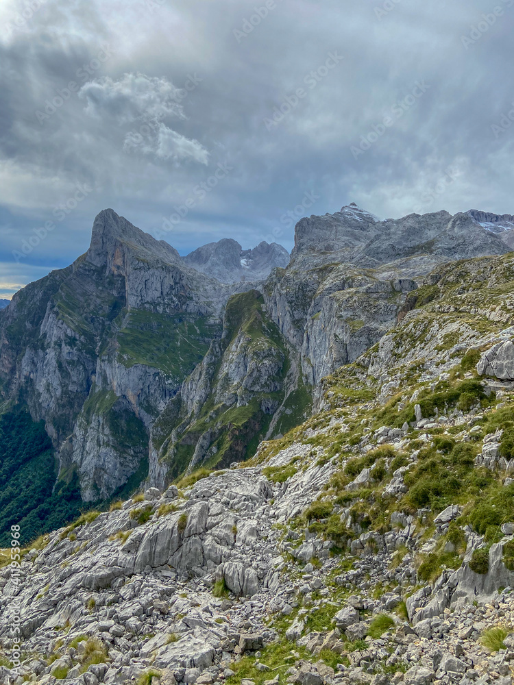 The Majestic mountains of the Eastern Massif of the Picos de Europa. Eagle flying over Pena Remona. The Eastern Massif, or Andará, between the Duje and Hermida gorges. The Majestic mountains of the Eastern Massif of the Picos de Europa. Eagle flying over Pena Remona. The Eastern Massif, or Andará, between the Duje and Hermida gorges.