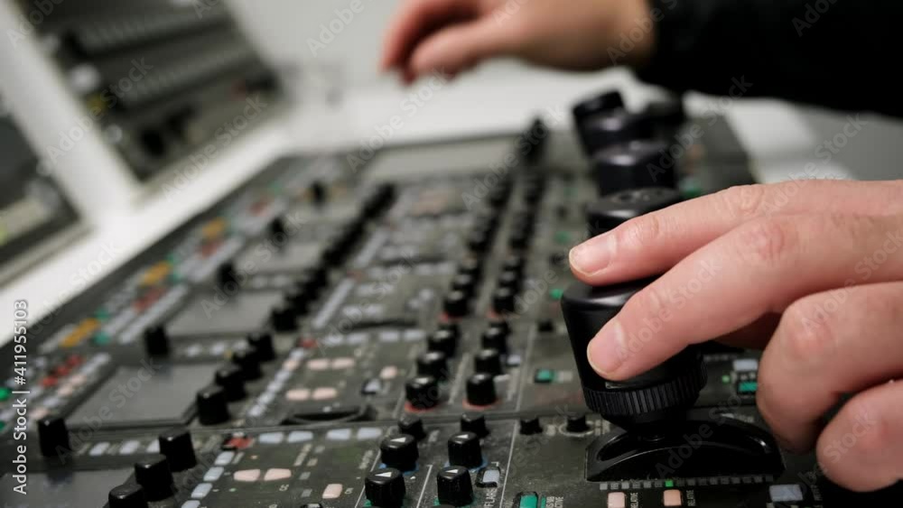 Producer Working With Control Desk in TV Studio Producer Working With Control Desk in TV Studio