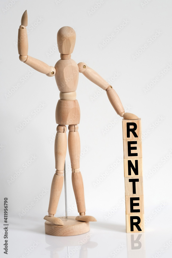 The wooden man raised his hand, and under his left hand he has cubes with the inscription - RENTER The wooden man raised his hand, and under his left hand he has cubes with the inscription - RENTER