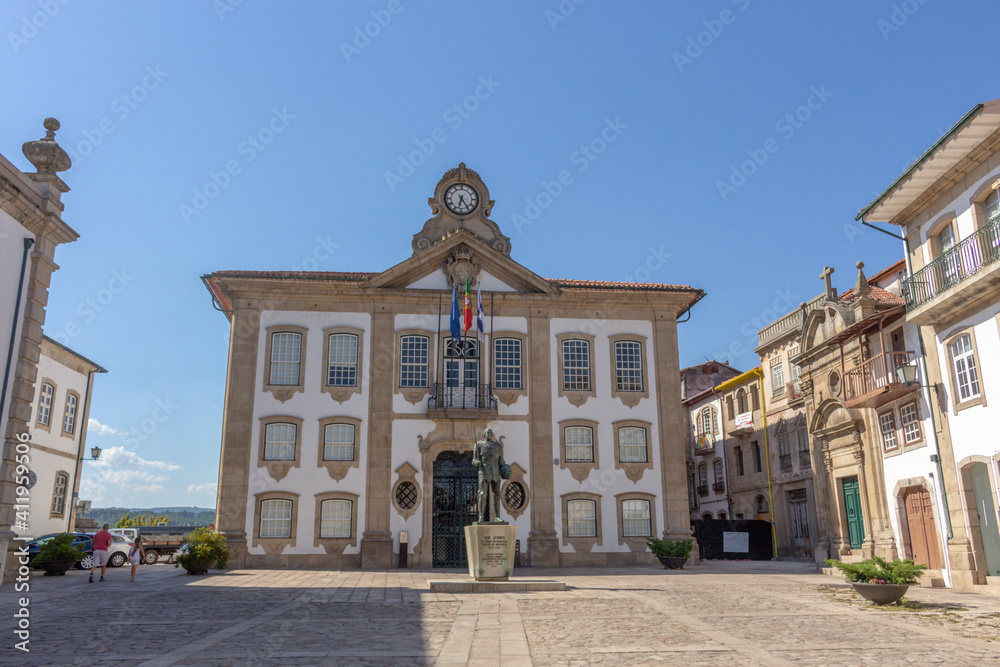 Chaves, Portugal - September 6, 2020: Chaves City Hall (Camara Municipal) is perched atop the Camoes Square. Statue erected in honor of Afonso, 8th count of Barcelos and 1st Duke of Braganza.