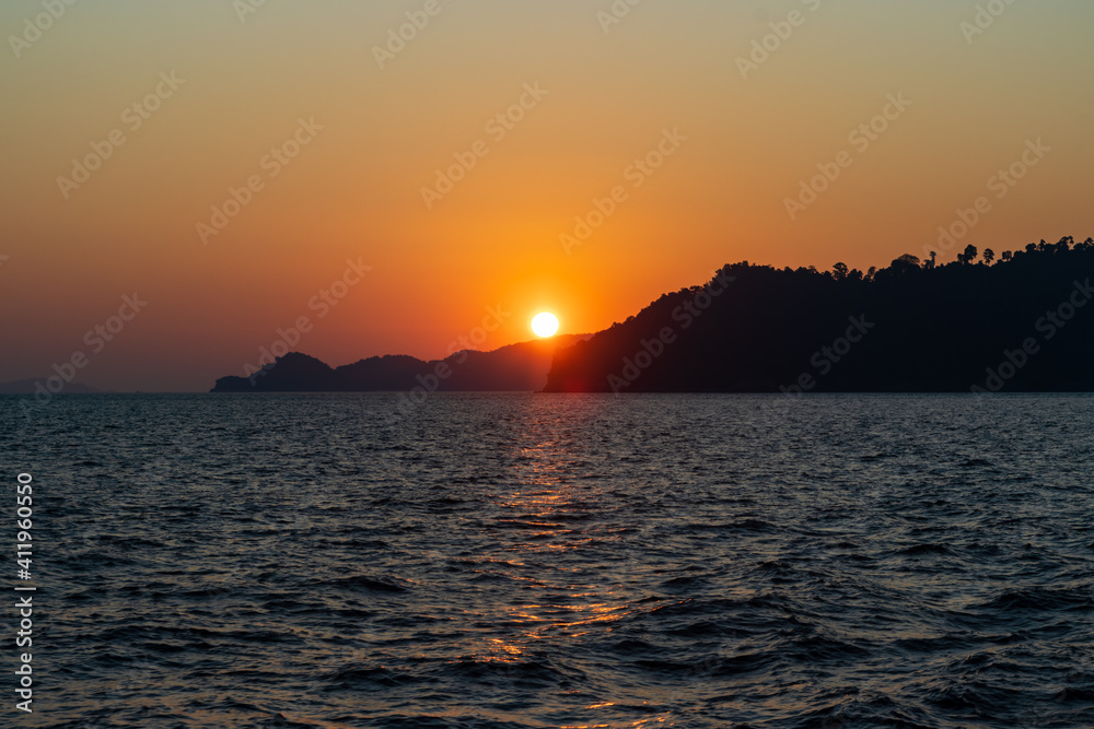 Sunset over the ocean in the Mergui Archipelago, Myanmar Sunset over the ocean in the Mergui Archipelago, Myanmar