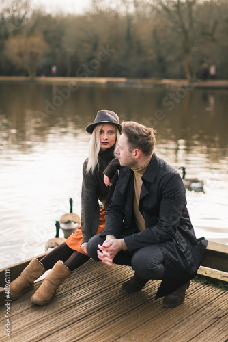 man and woman, background lake