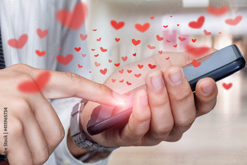 Concept of happy valentines day using mobile . Concept of happy valentines day using mobile .