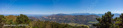 Panoramic view from Mirador del Fitu viewpoint Fito in Asturias, Spain. It is located in the council of Parres is one of the viewpoints from which to enjoy the Cantabrian Sea and the Picos de Europa. © An Instant of Time