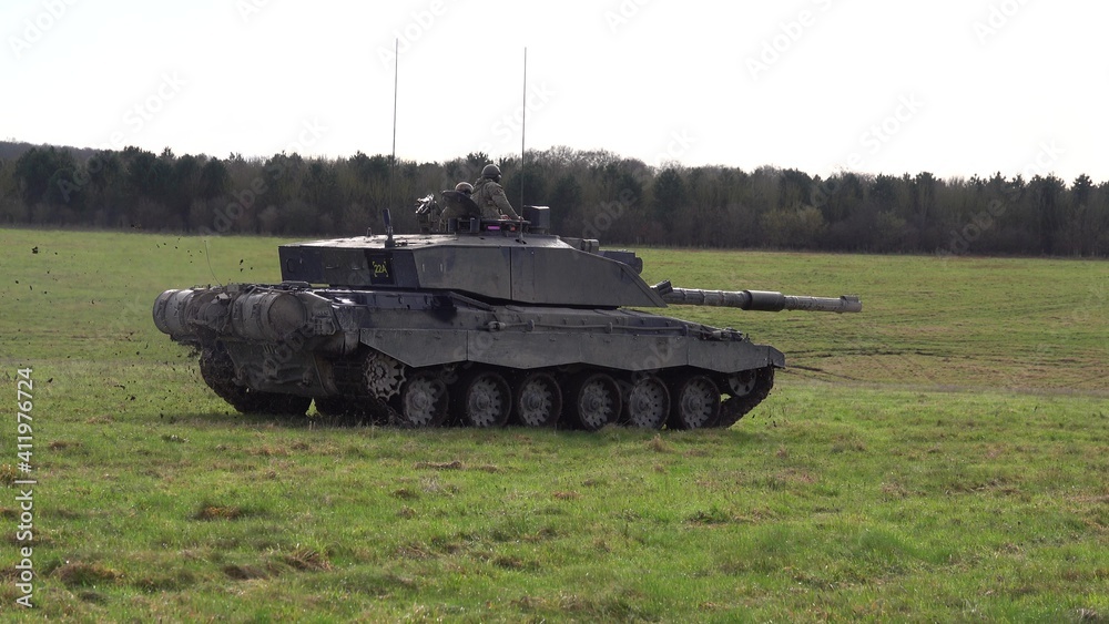 Action shot of a British army Challenger 2 FV4034 main battle tank on military exercise, Salisbury Plain UK Action shot of a British army Challenger 2 FV4034 main battle tank on military exercise, Salisbury Plain UK