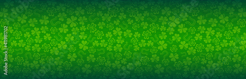 Green Patrick's Day greeting banner with green clovers. Patrick's Day holiday design. Horizontal background, headers, posters, cards, website. Vector illustration