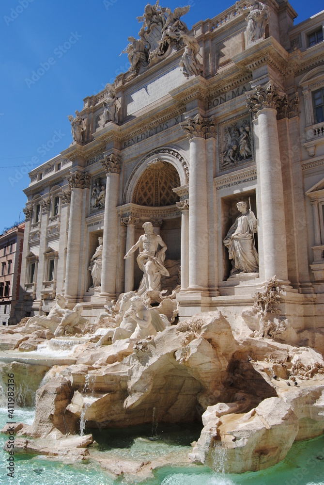 The Trevi Fountain, the most famous fountain in Rome, Trevi district, designed by Italian architect Nicola Salvi in the 18th century, in Neoclassical style, famous for coin throwing tradition.