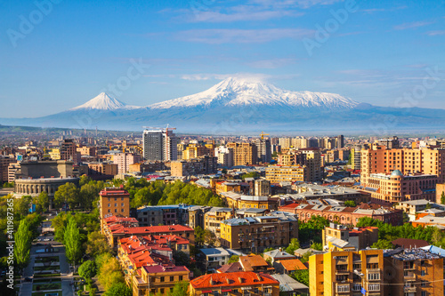 Mount Ararat (Turkey) at 5,137 m viewed from Yerevan, Armenia. This snow-capped dormant compound volcano consists of two major volcanic cones described in the Bible as the resting place of Noah's Ark. photo