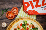 pizza with salmon and tomatoes on wood background for restaurant menu8