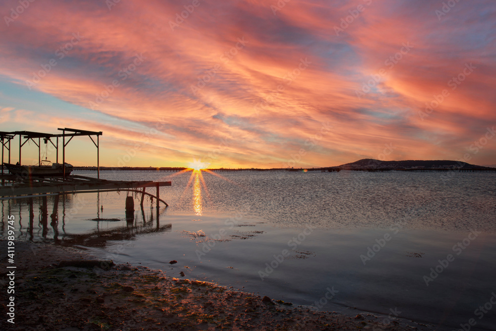 Fototapeta premium Sunrise on the Thau Lagoon with Sete