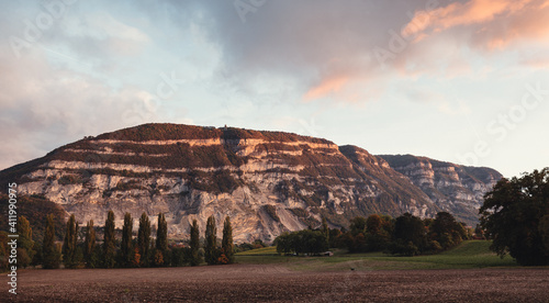 Autumnal sunset capture of the glowing cliffs of Mont Salève. Haute-Savoie, France