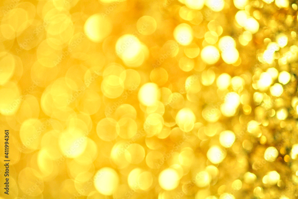 Gold defocused glitter. Bokeh light of gold glitters background. Gold defocused glitter. Bokeh light of gold glitters background.