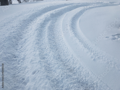 Car curved track in snow. Fast ride  © Piotr