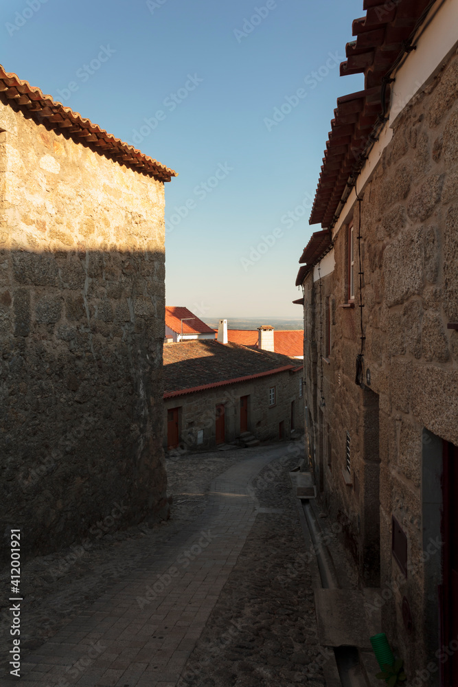 Narrow street on portuguese historic village Castelo Novo