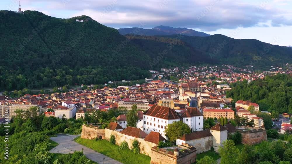Brasov, Romania - Aerial view of the Citadel at sunset Brasov, Romania - Aerial view of the Citadel at sunset
