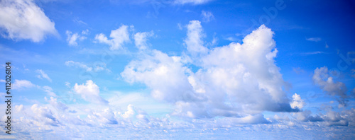Beautiful blue sky and white fluffy clouds, Vibrant color sky with cloud on a sunny day, The morning sky with clouds in various shapes, Beautiful natural cirrus cloud background. © DSM