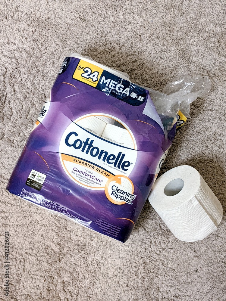 Seattle, WA / USA - October 23, 2019: A 6 pack of Cottonelle toilet paper  opened up, laying flat on soft surface. Photos | Adobe Stock