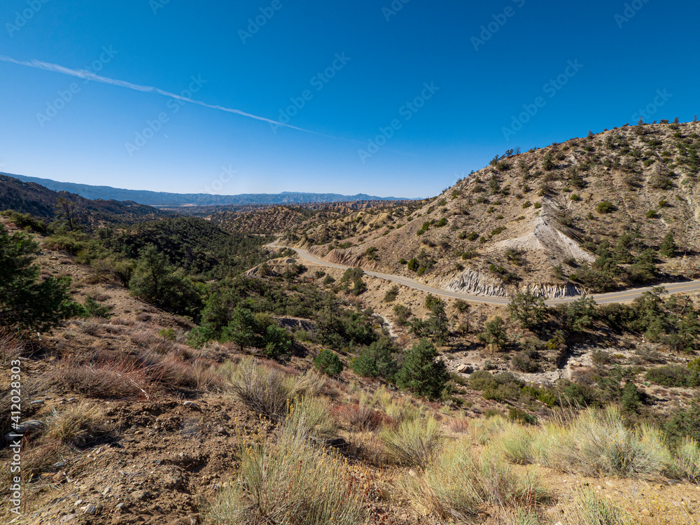 Wide angle view of California Mountain Landscape with Winding Road Daytime